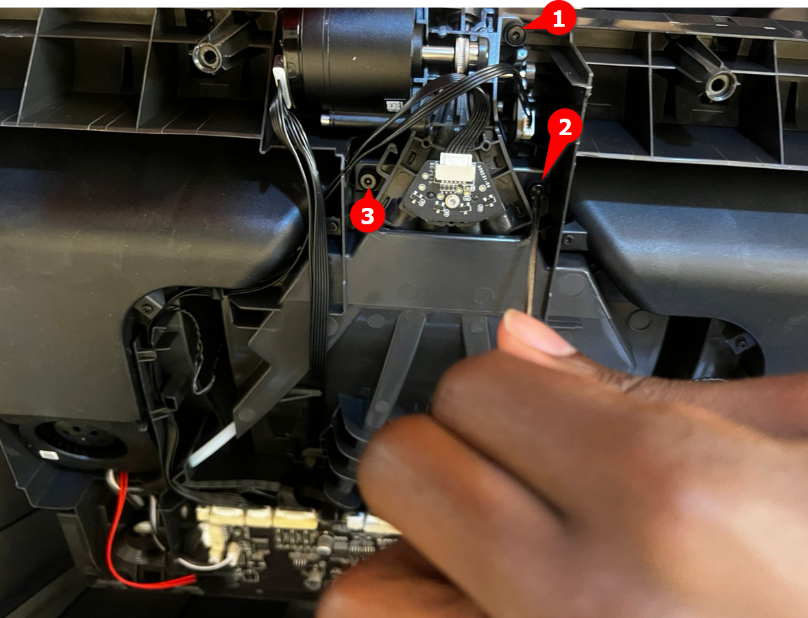 06_removing_three_screws.png